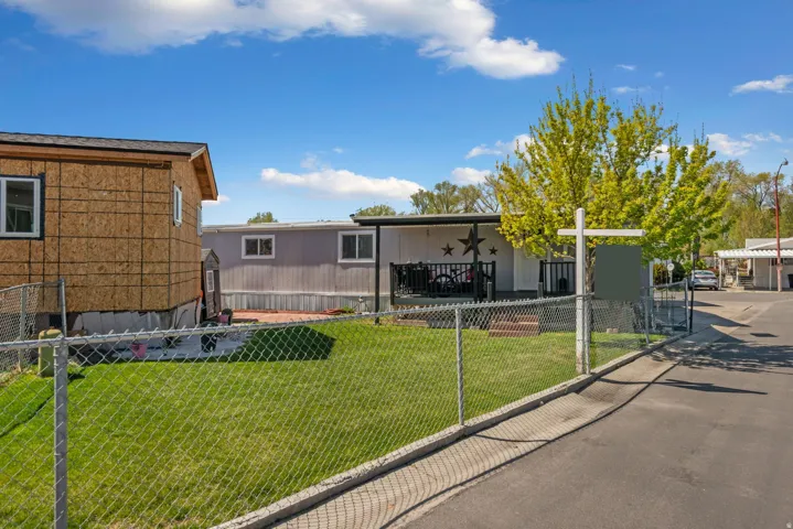 Back of property featuring a patio area