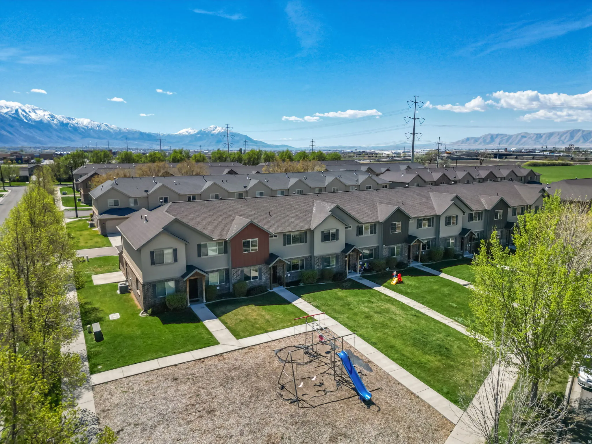 Aerial perspective of suburban area featuring mountains