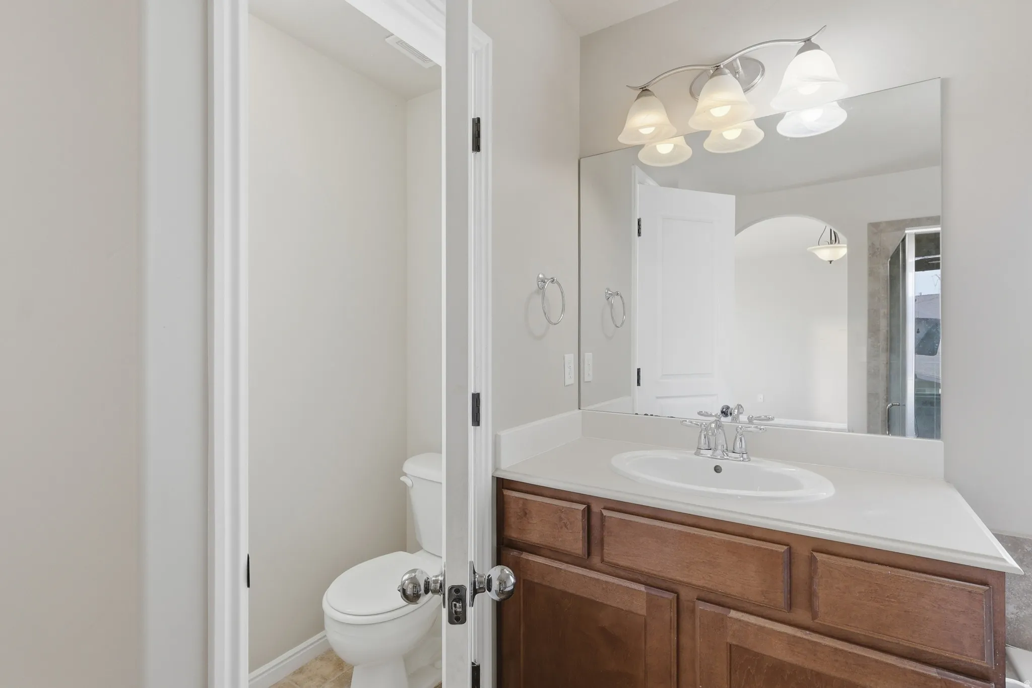 Bathroom with toilet and vanity