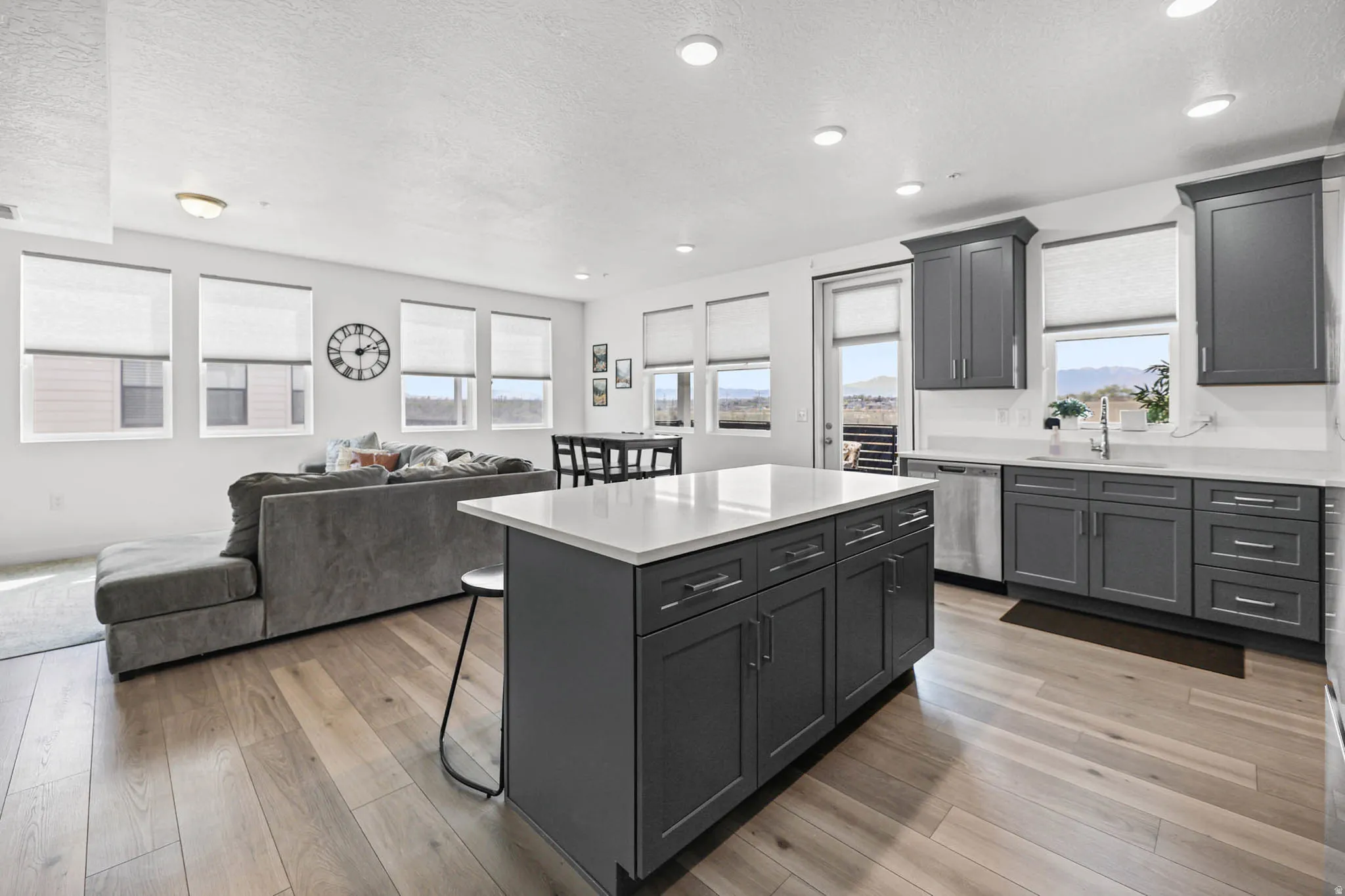 Kitchen/living and dining area. Walkout door to patio.
