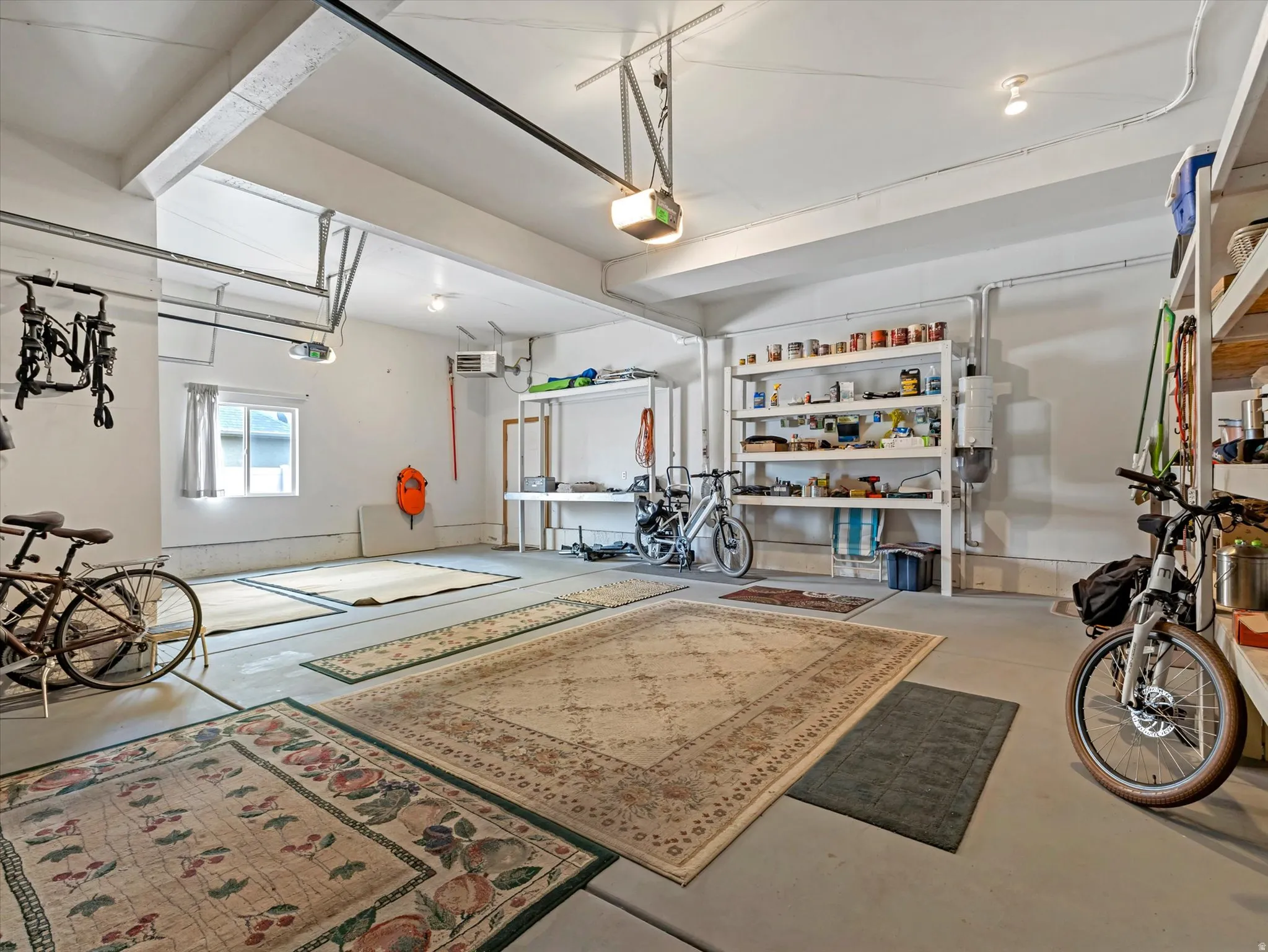 Garage with a garage door opener and a heating unit