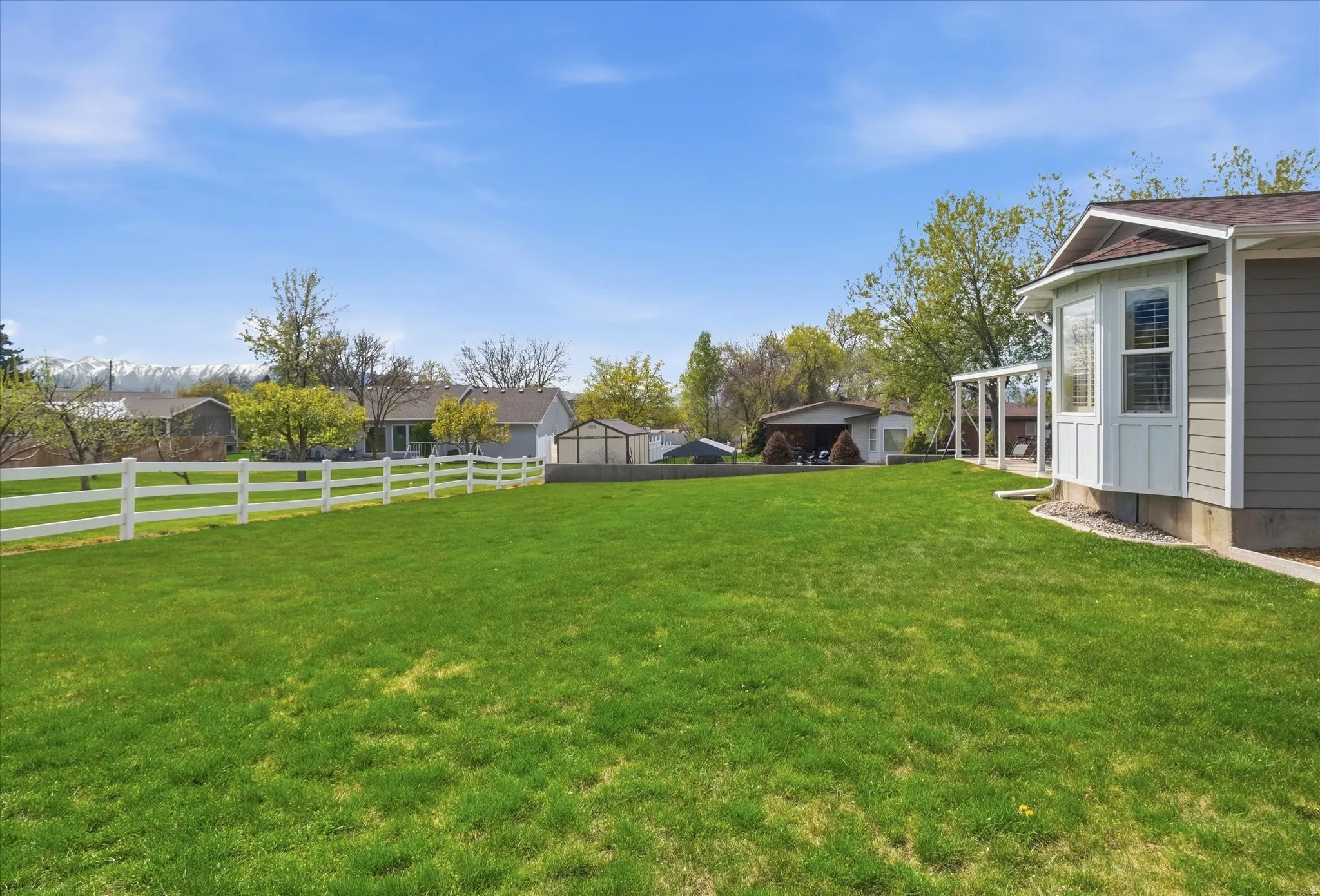 View of fenced backyard