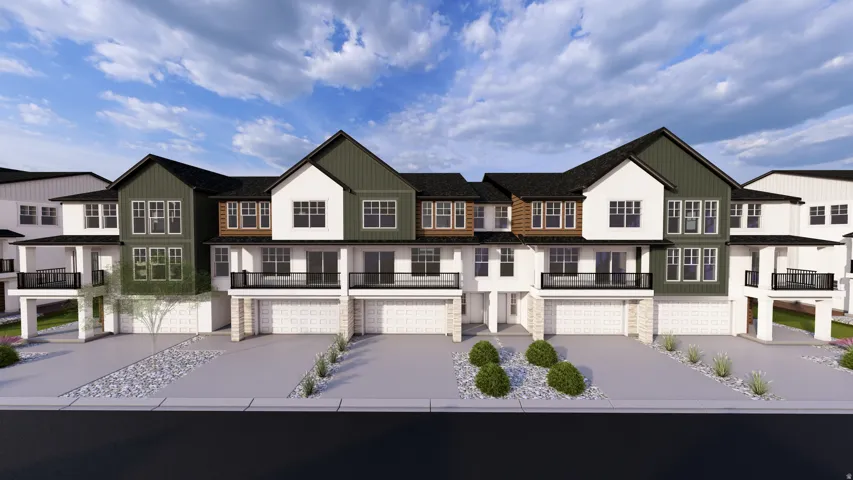 View of front of house with a balcony, a garage, and a residential view