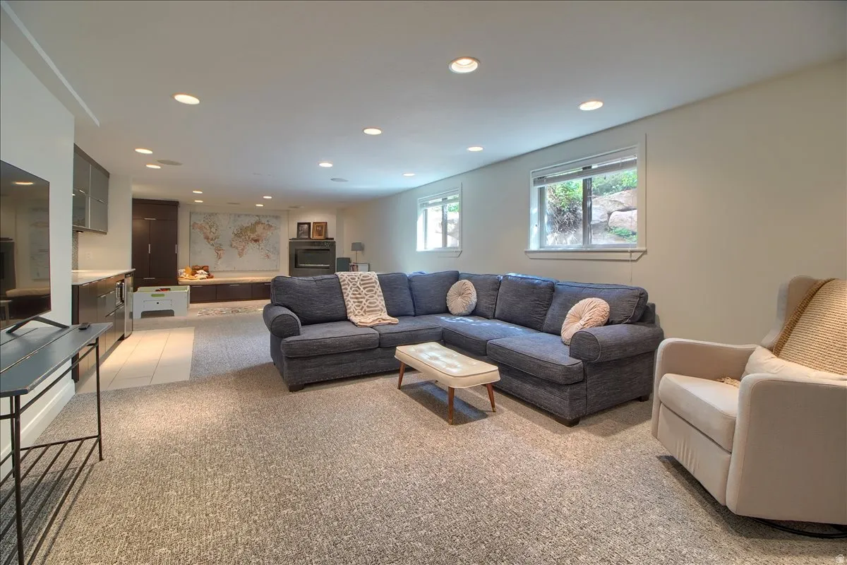 Family room featuring recessed lighting and light colored carpet