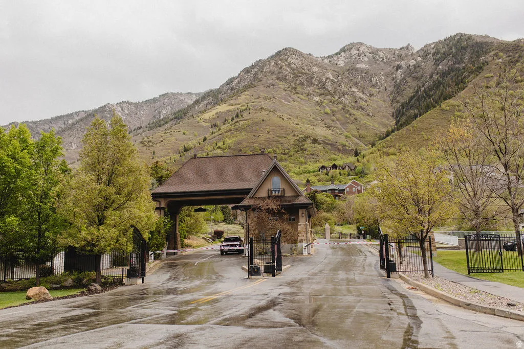 View of property's community featuring a gate and a mountain view