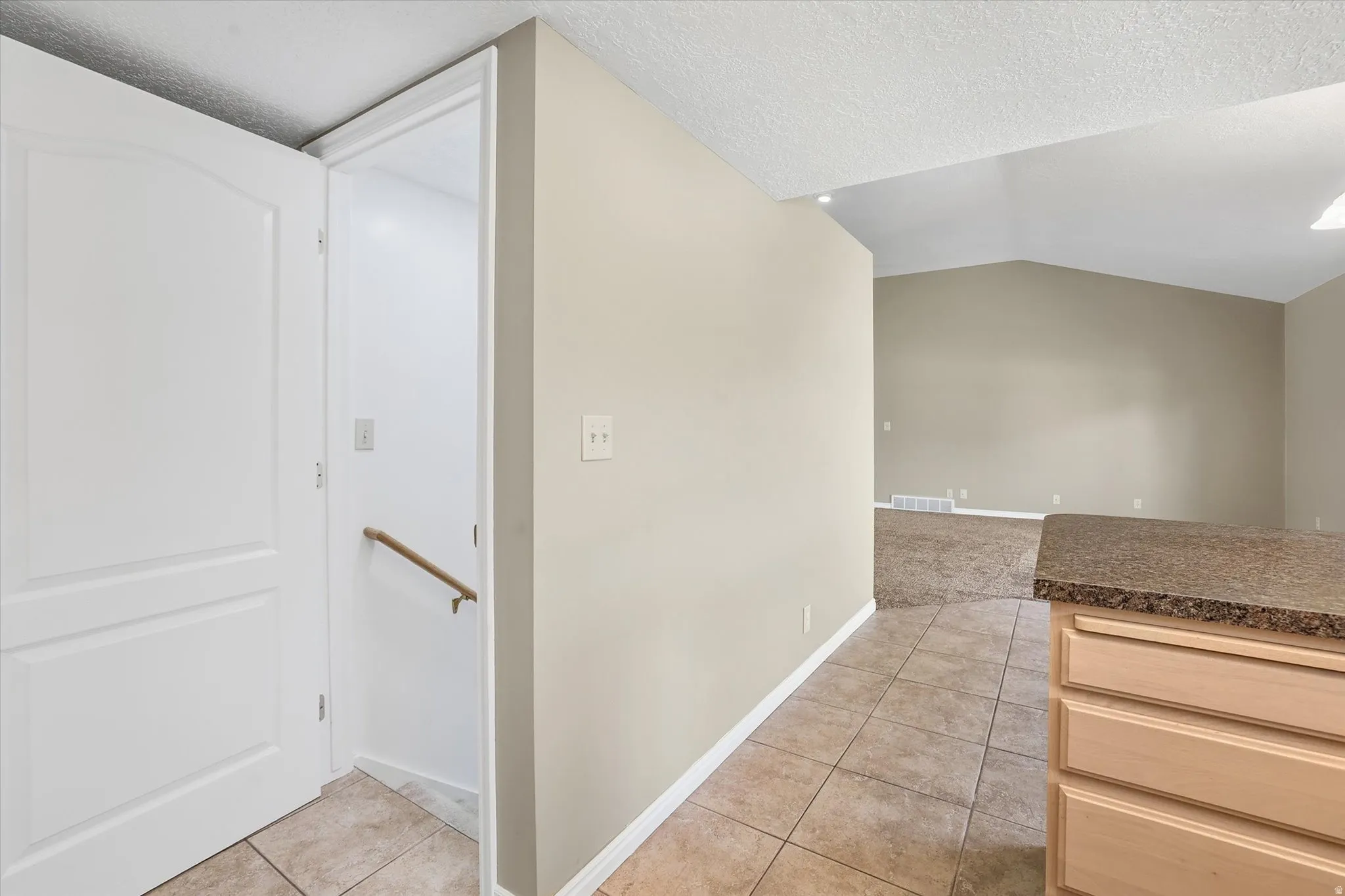 Door leading to basement from side of kitchen