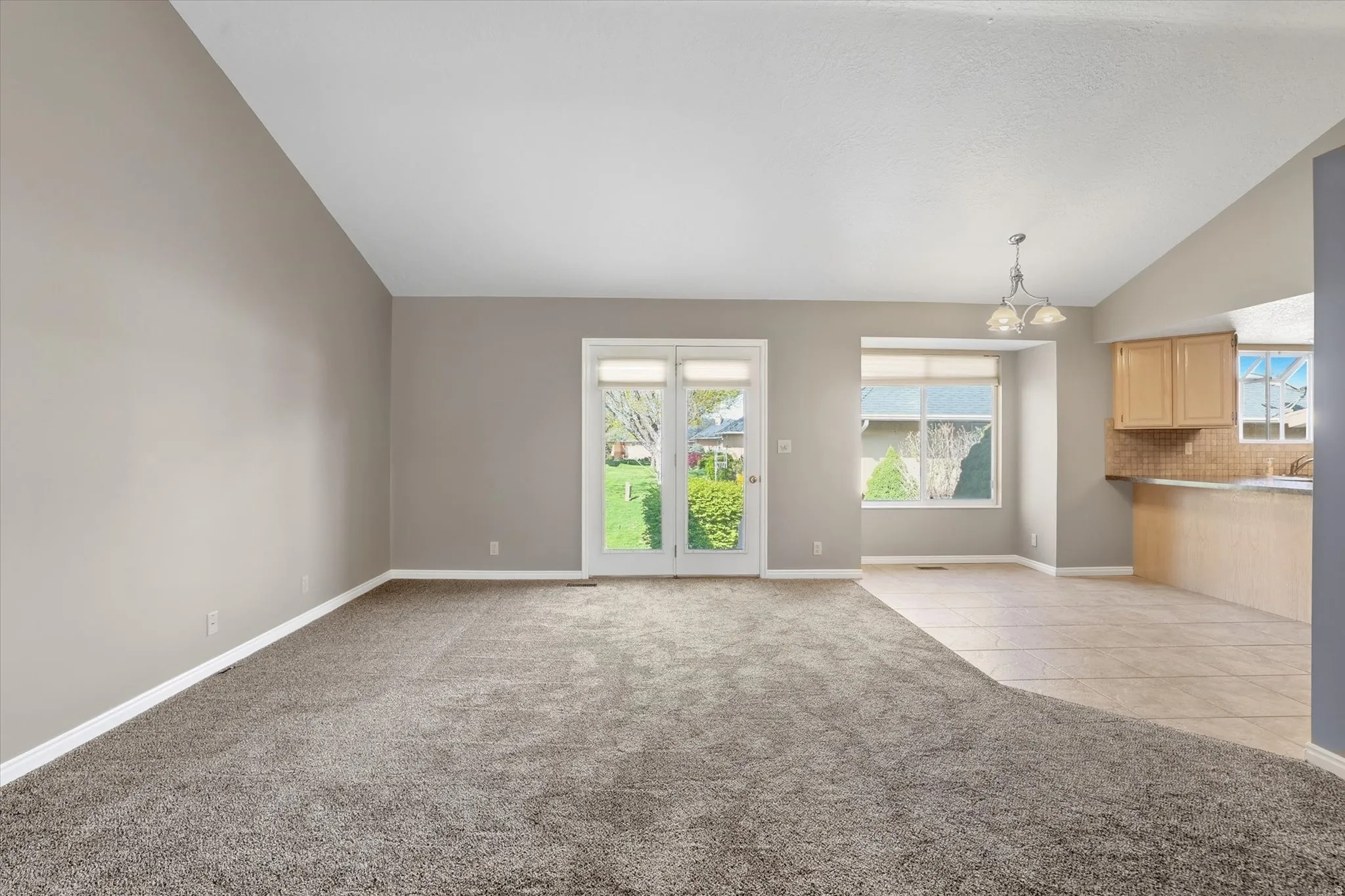 Living room with vaulted ceiling