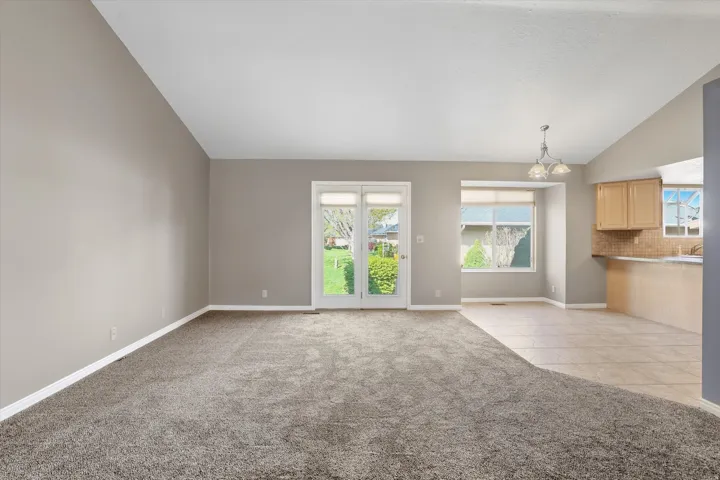 Living room with vaulted ceiling