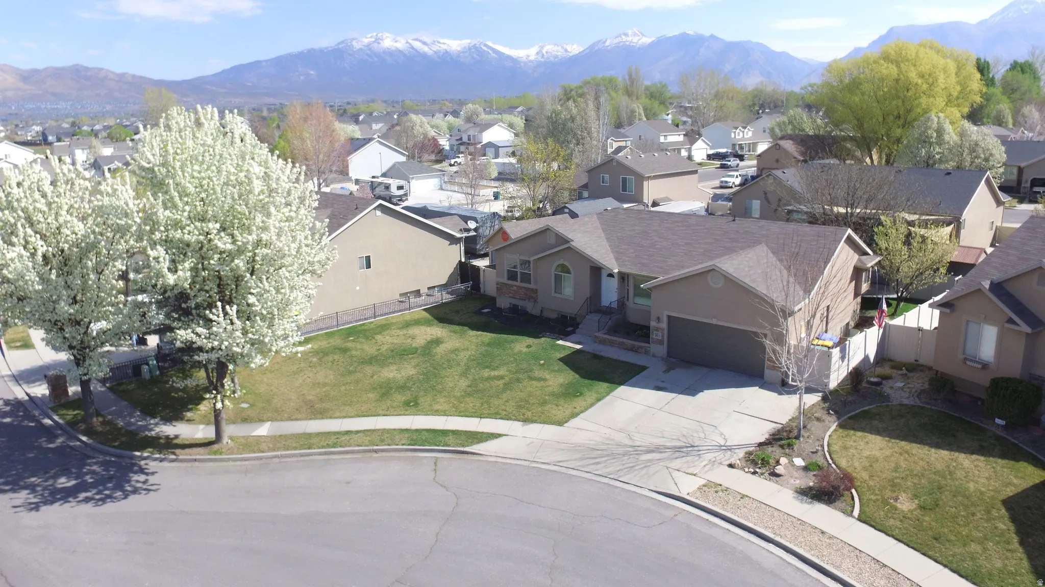Aerial perspective of suburban area with mountains