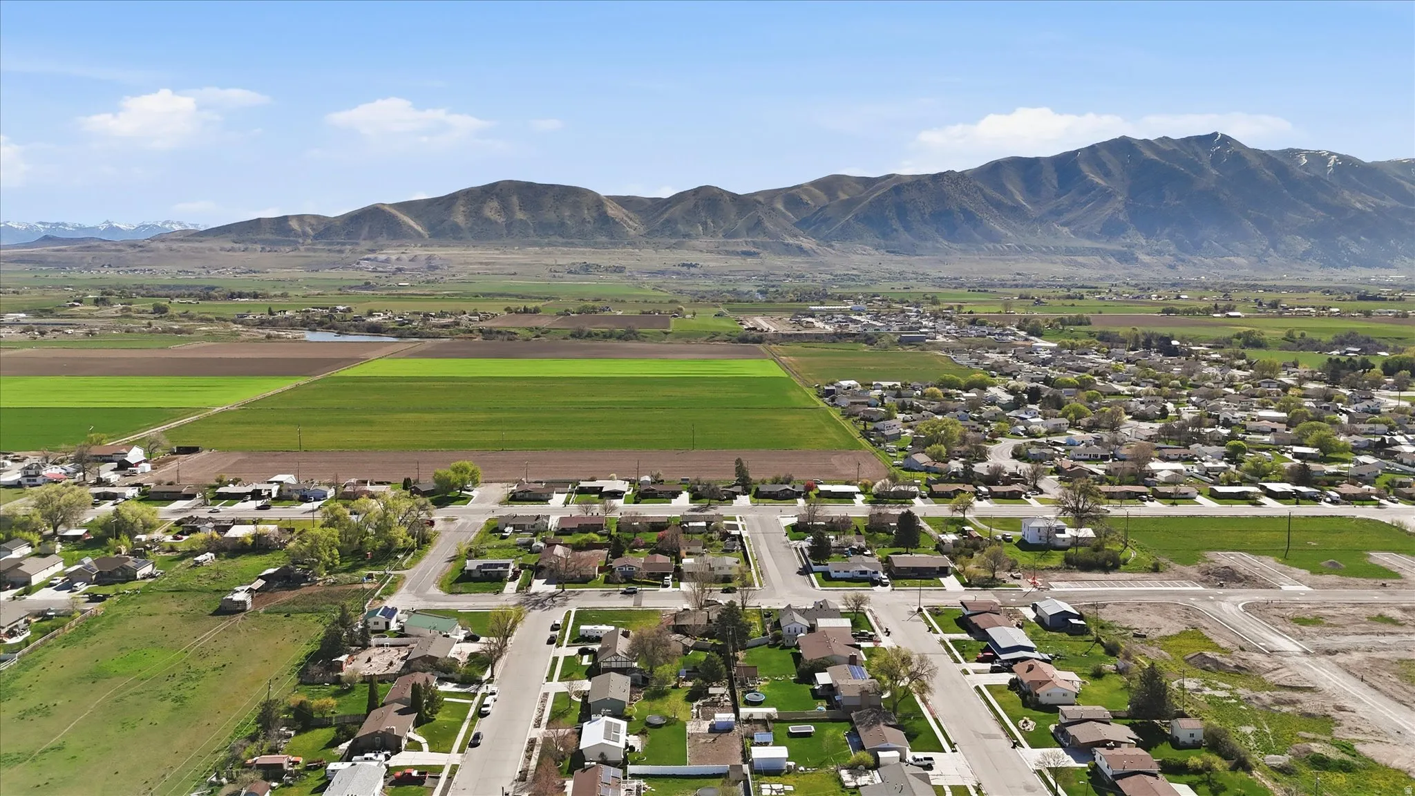 Aerial view of residential area with mountains