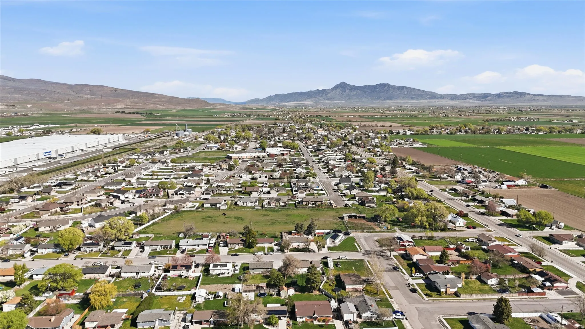 Aerial perspective of suburban area with mountains