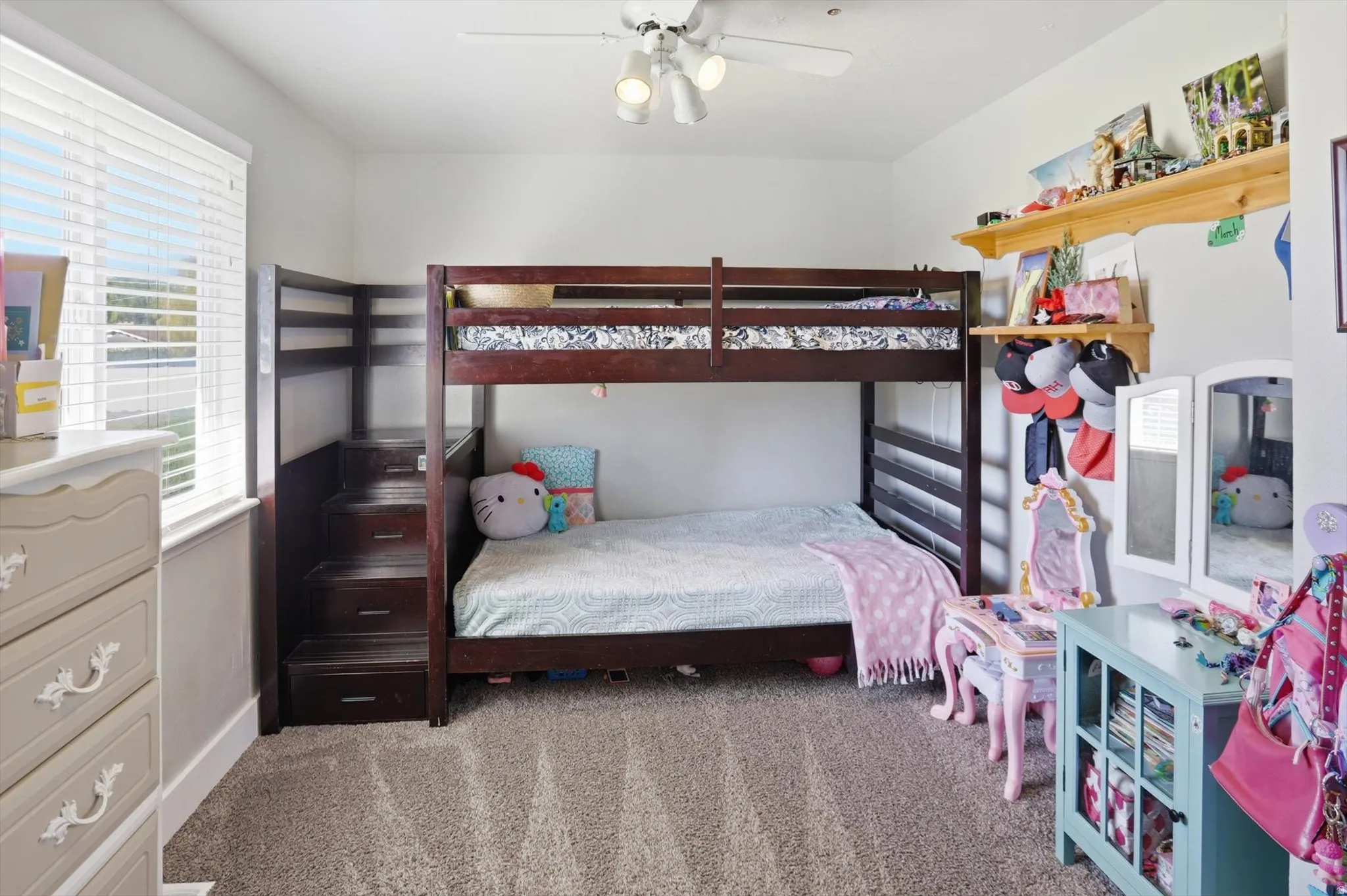 Bedroom featuring carpet flooring and ceiling fan