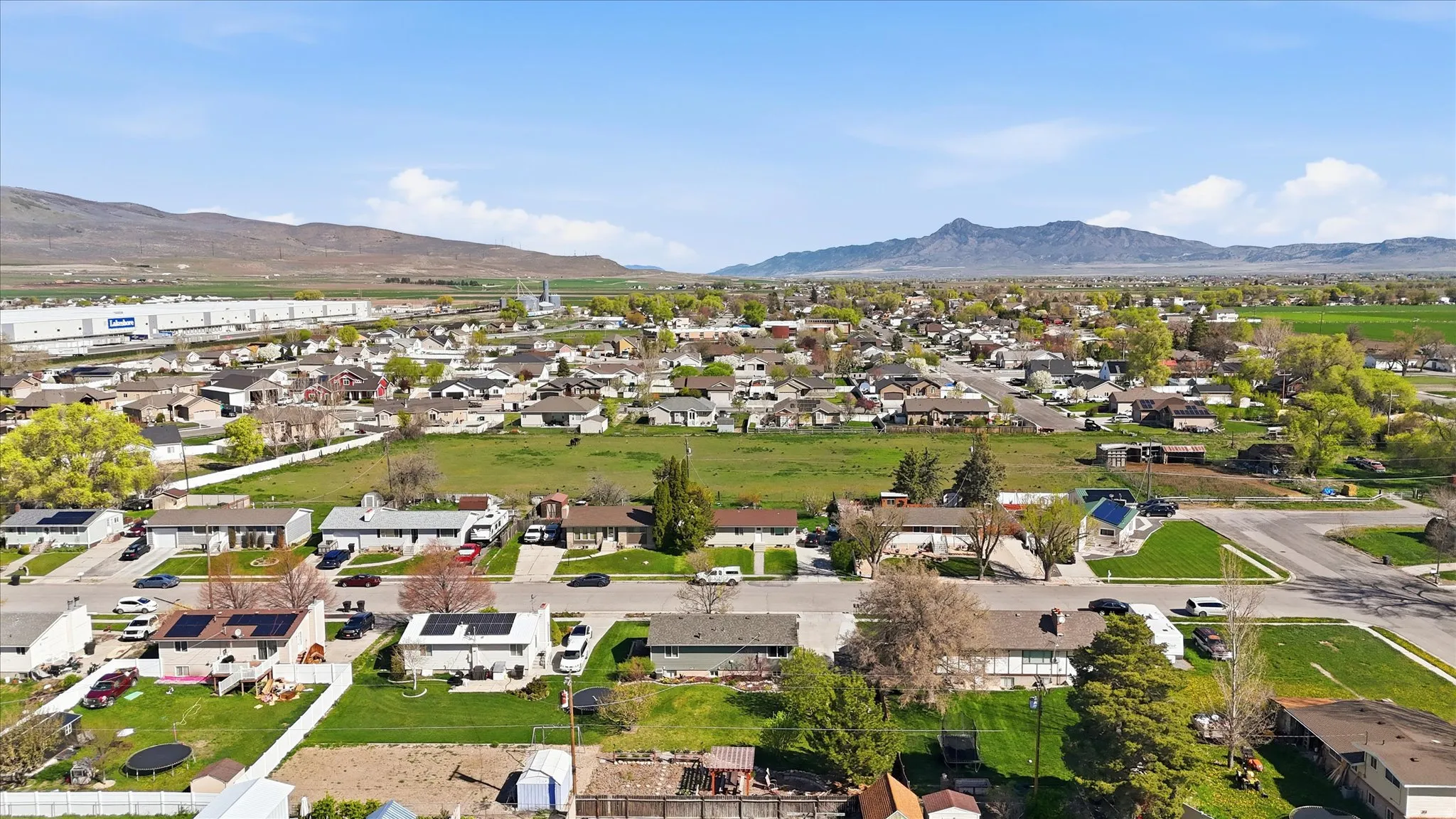 Aerial perspective of suburban area featuring mountains