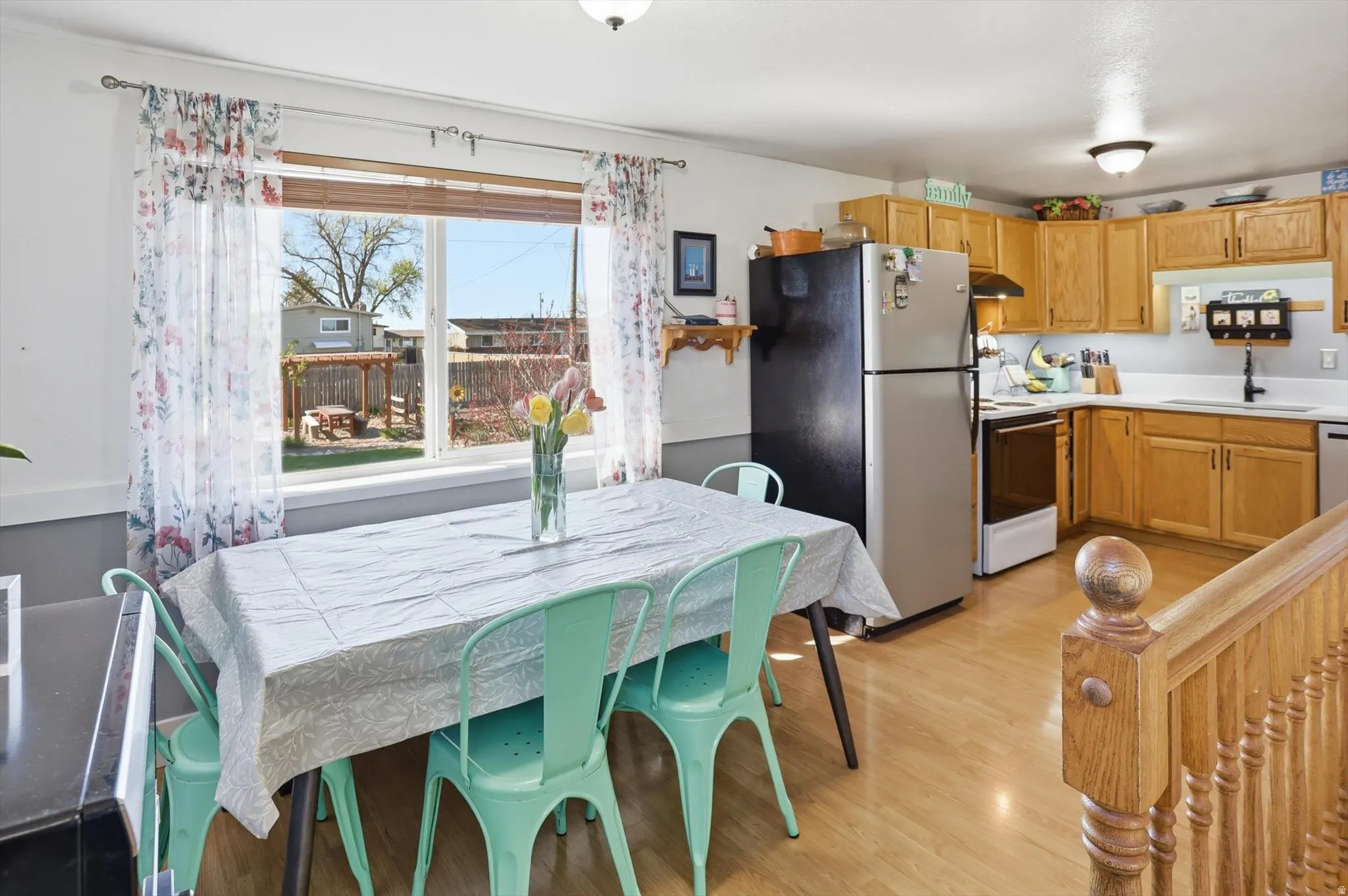 Dining room with light wood-style flooring