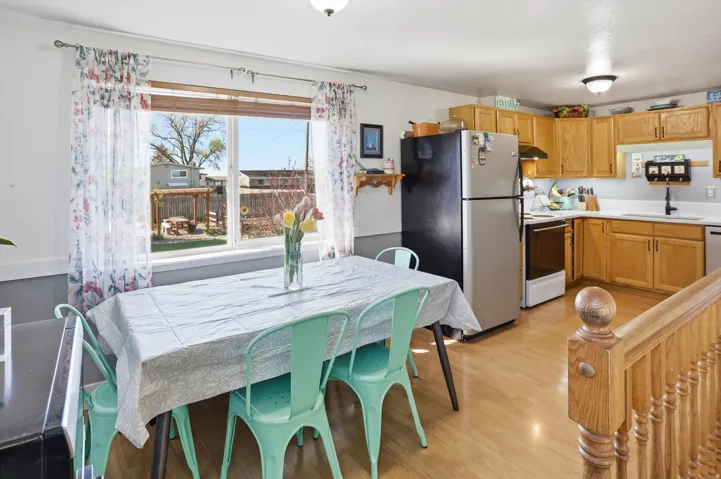 Dining room with light wood-style flooring
