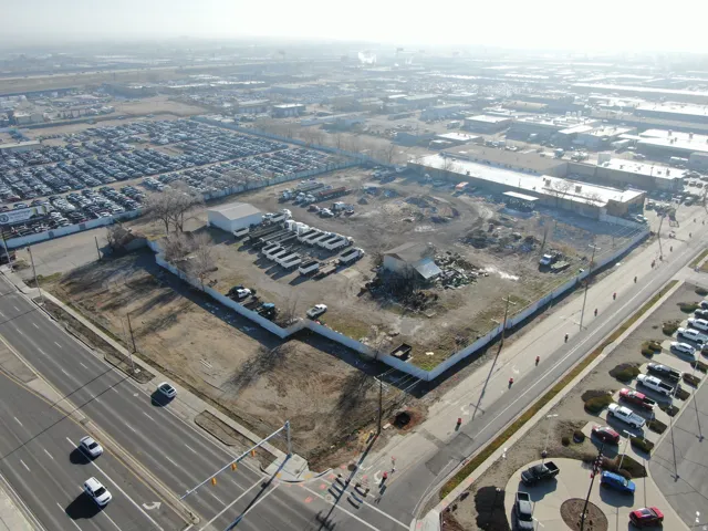 Aerial view of property's location featuring industrial structures