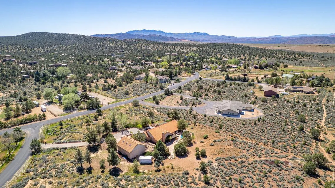 Drone / aerial view of a mountainous background and a desert landscape