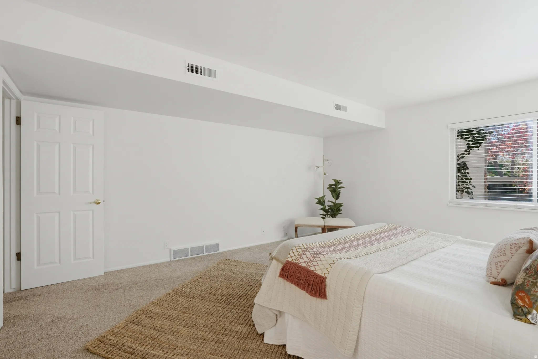 Bedroom with carpet flooring