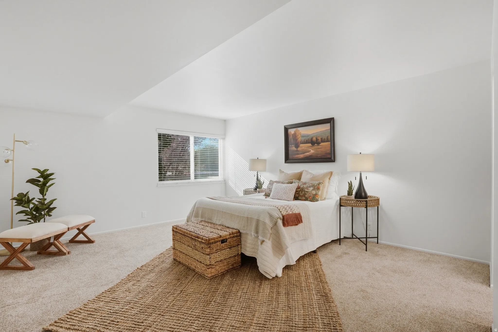 Carpeted bedroom with baseboards