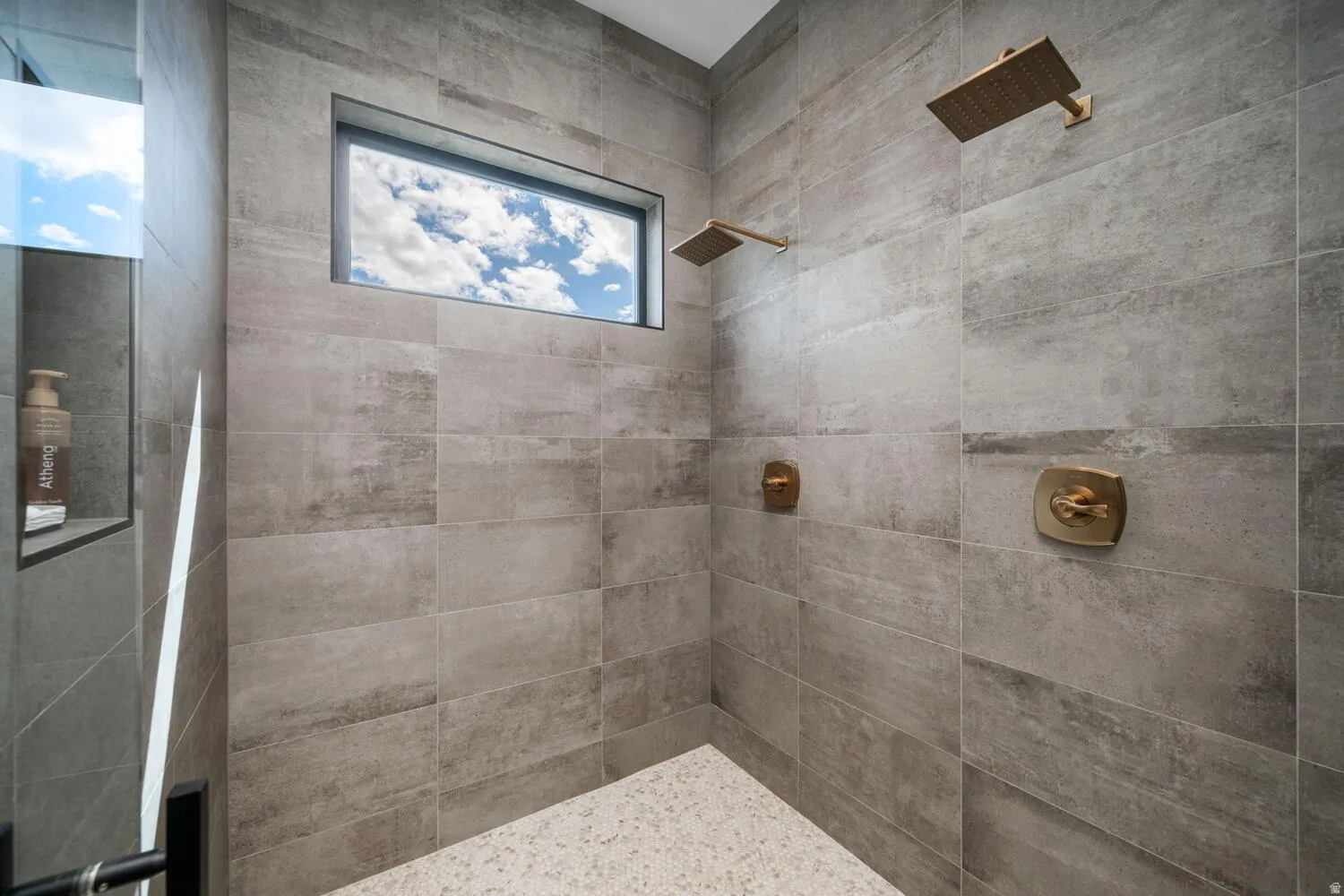 Bathroom with a tile shower