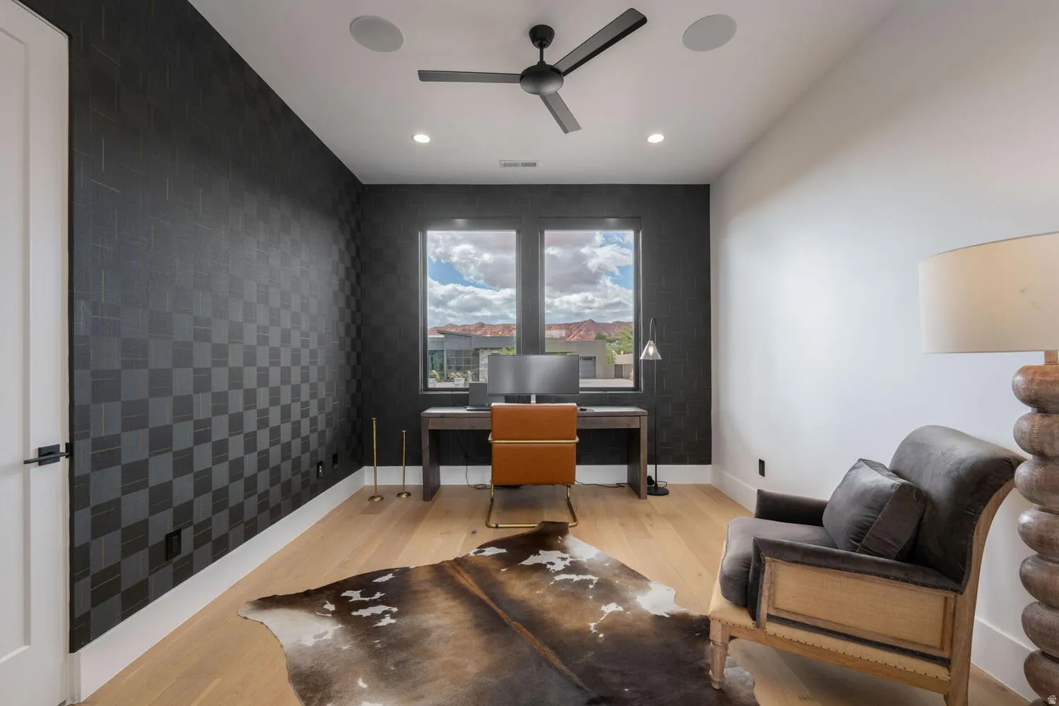 Office area with light wood-style flooring, a ceiling fan, an accent wall, and recessed lighting