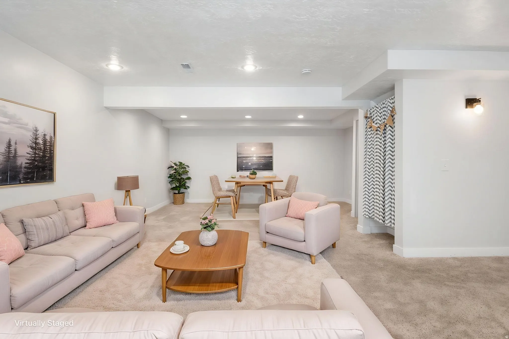 Finished Basement with light carpet and recessed lighting