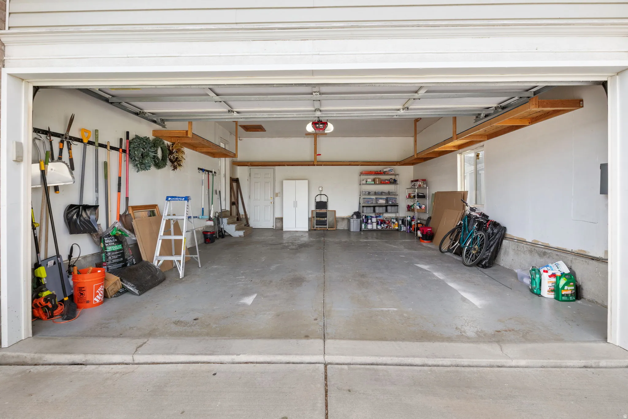 2 car garage with ceiling storage