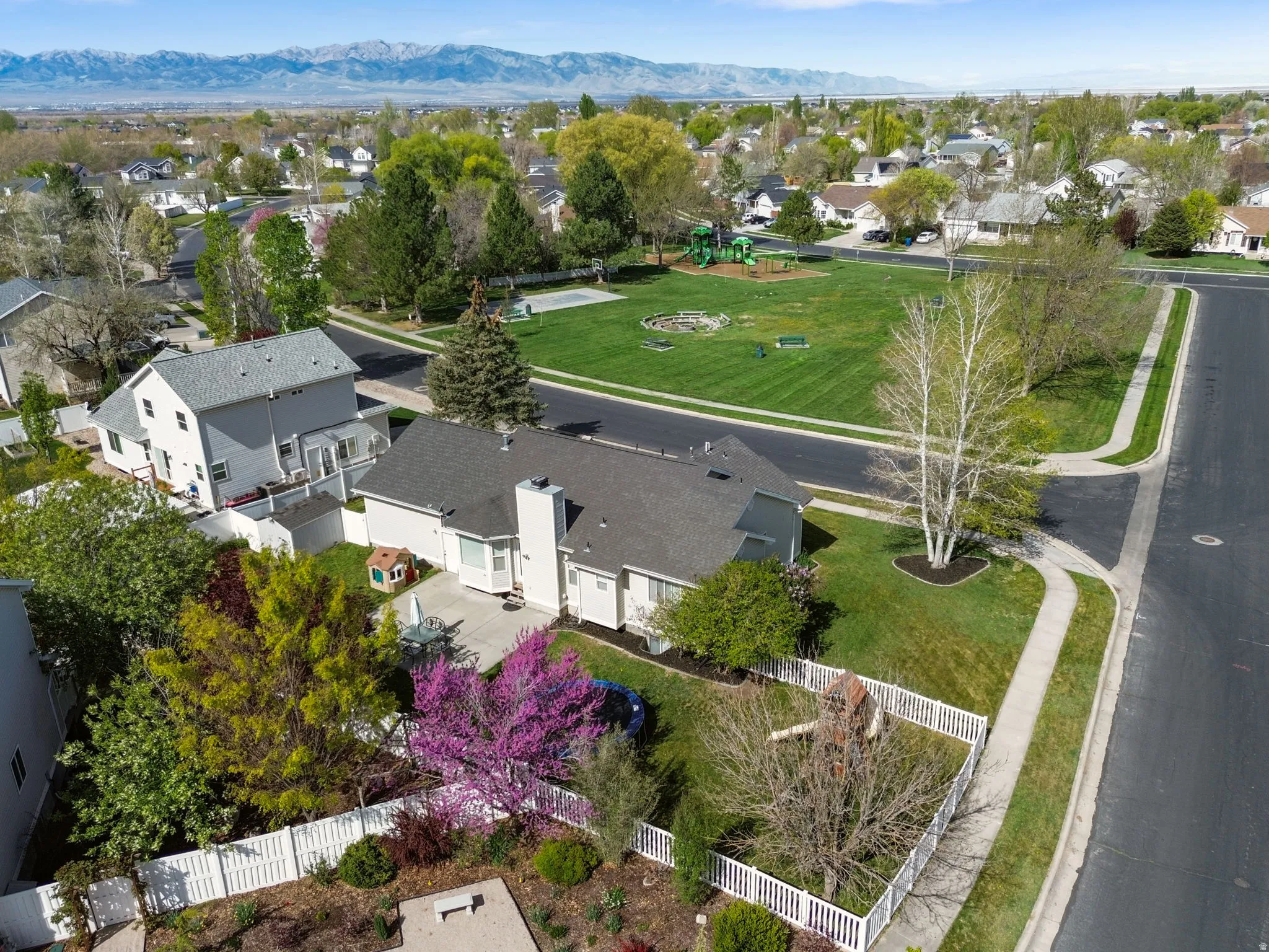 Aerial perspective of home with Woodland Park across the street