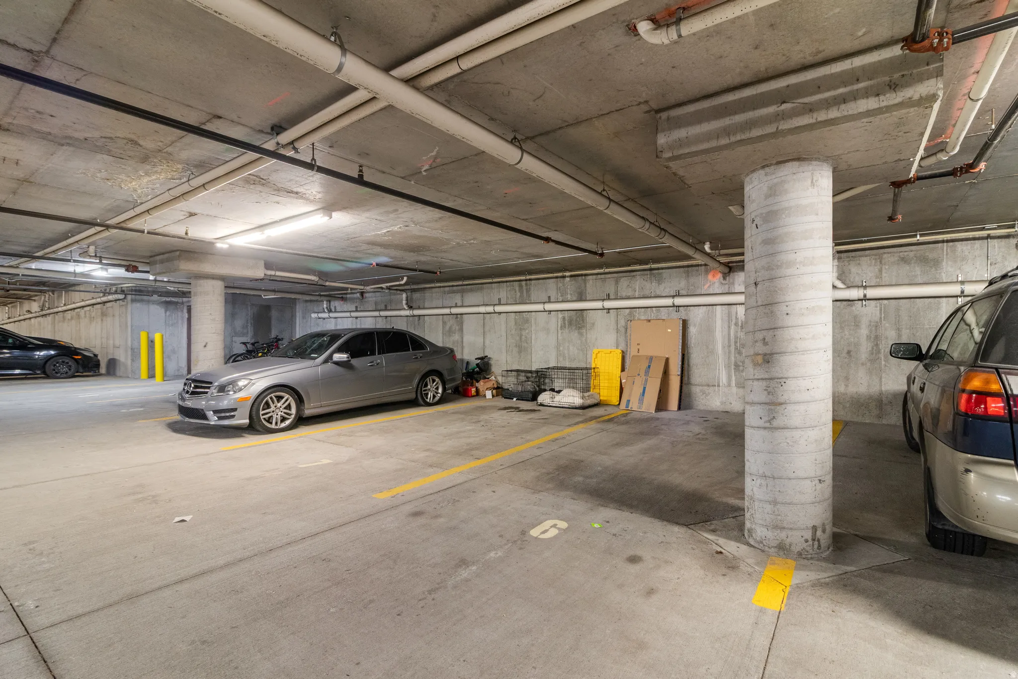 Garage featuring TWO parking spaces
