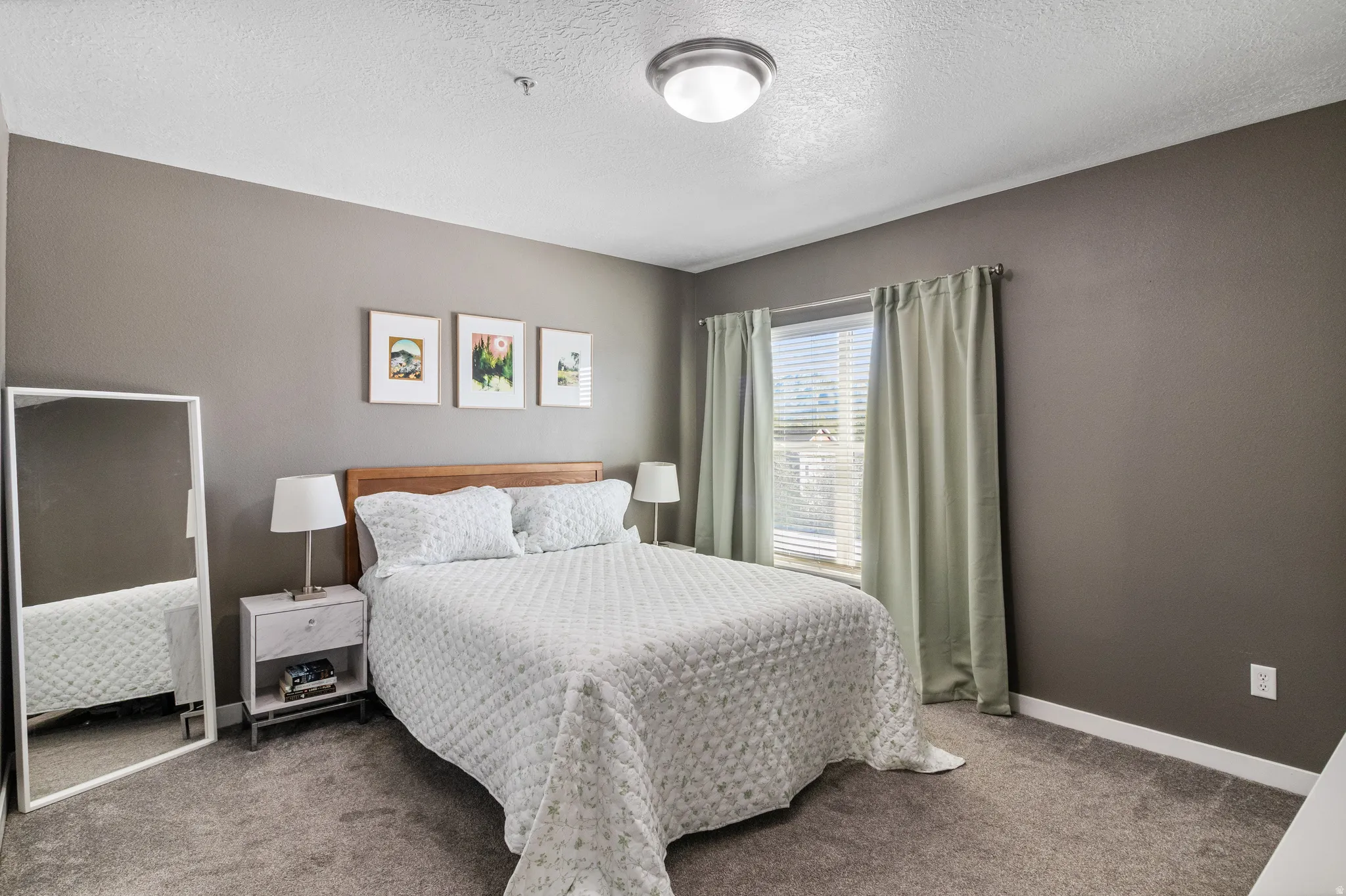 Primary bedroom with shared bathroom.
