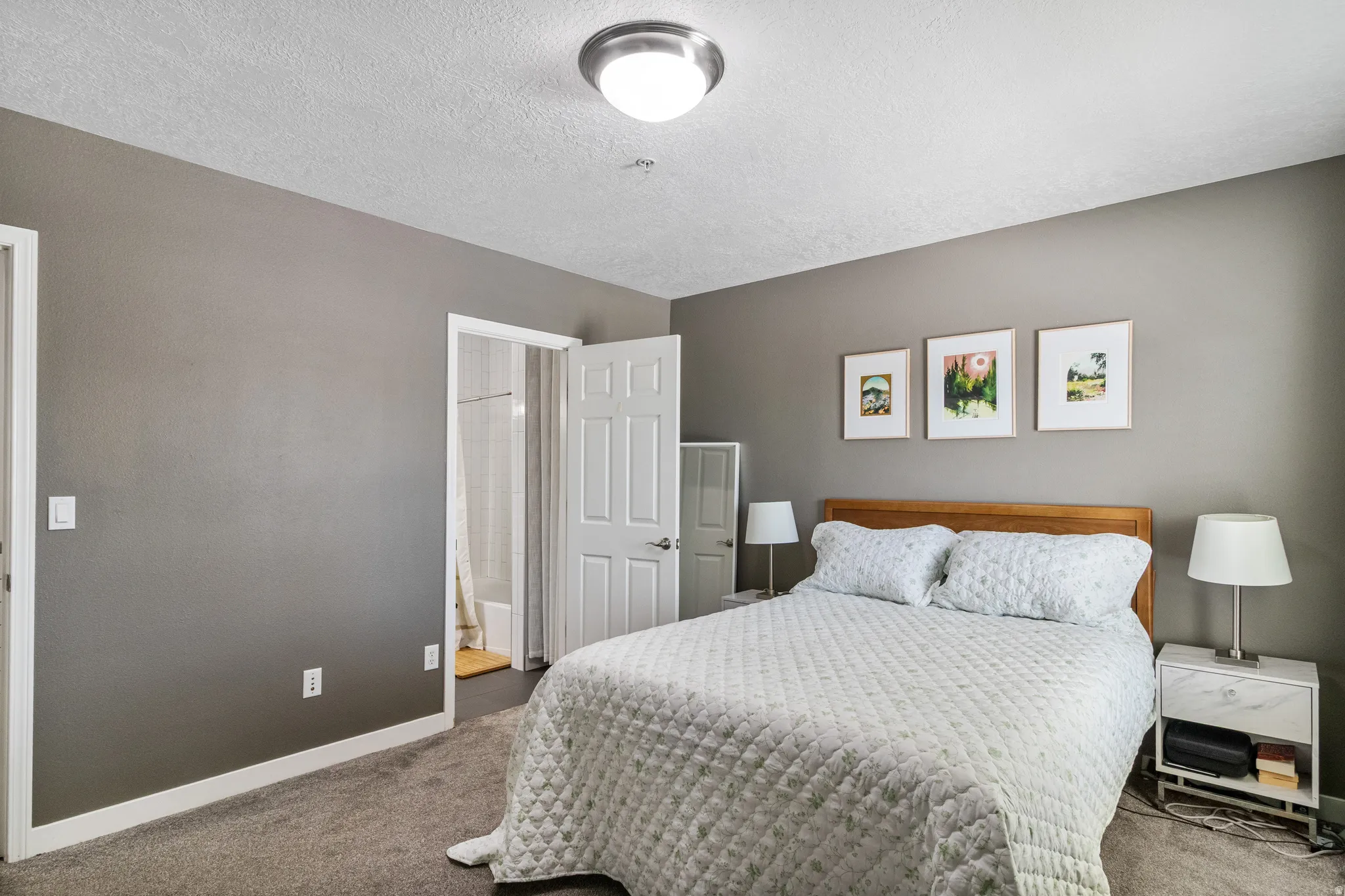 Primary bedroom with shared bathroom