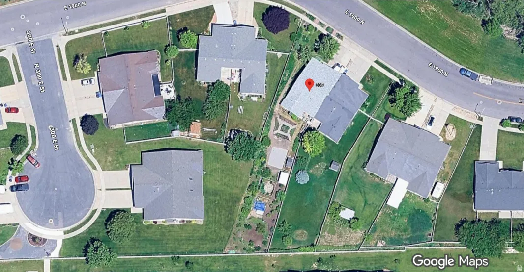 Aerial view of property and surrounding area.