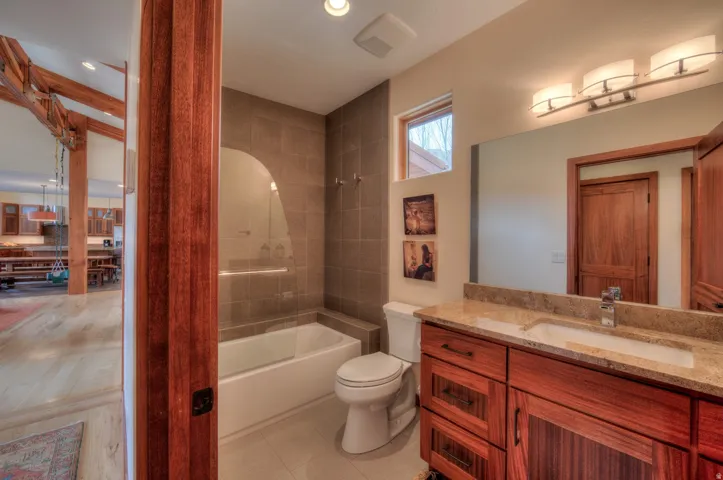 Bathroom with vanity and shower / bathtub combination