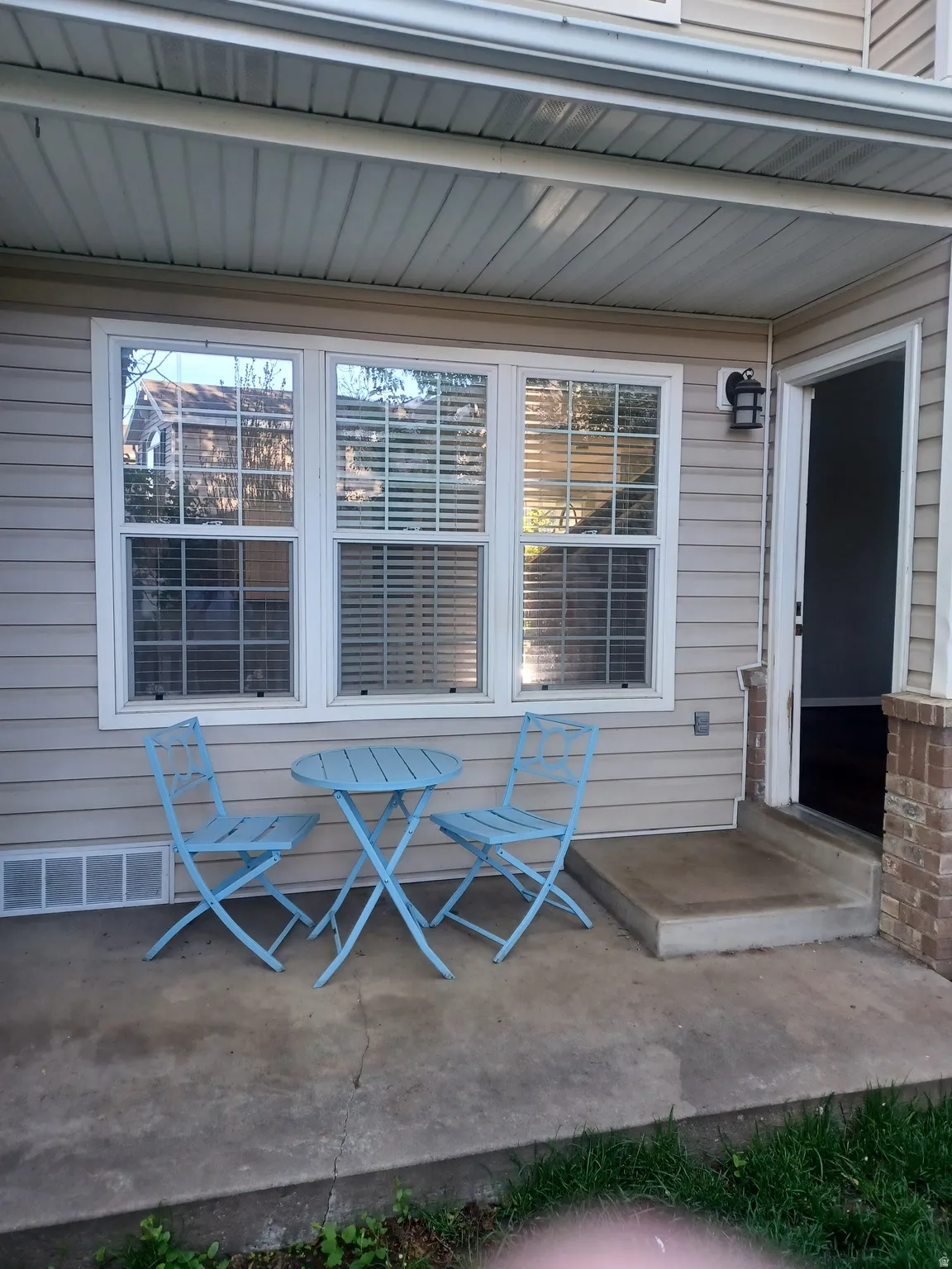 View of exterior backyard featuring a patio area