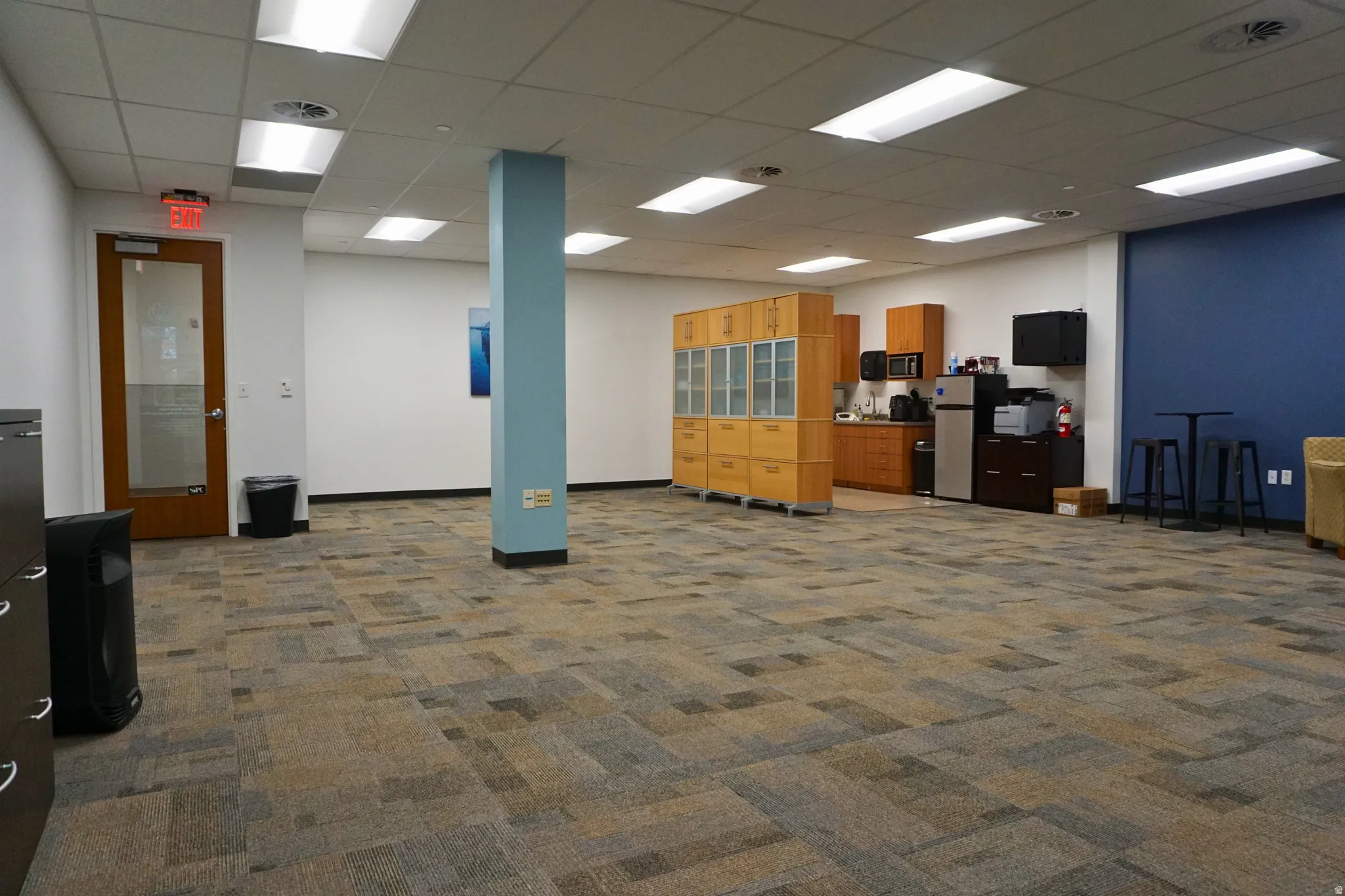 Office featuring a drop ceiling