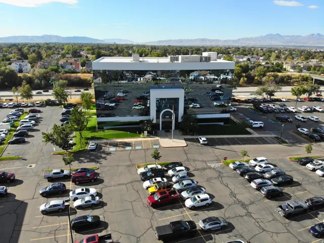 Bird's eye view of a commercial area and a mountain backdrop