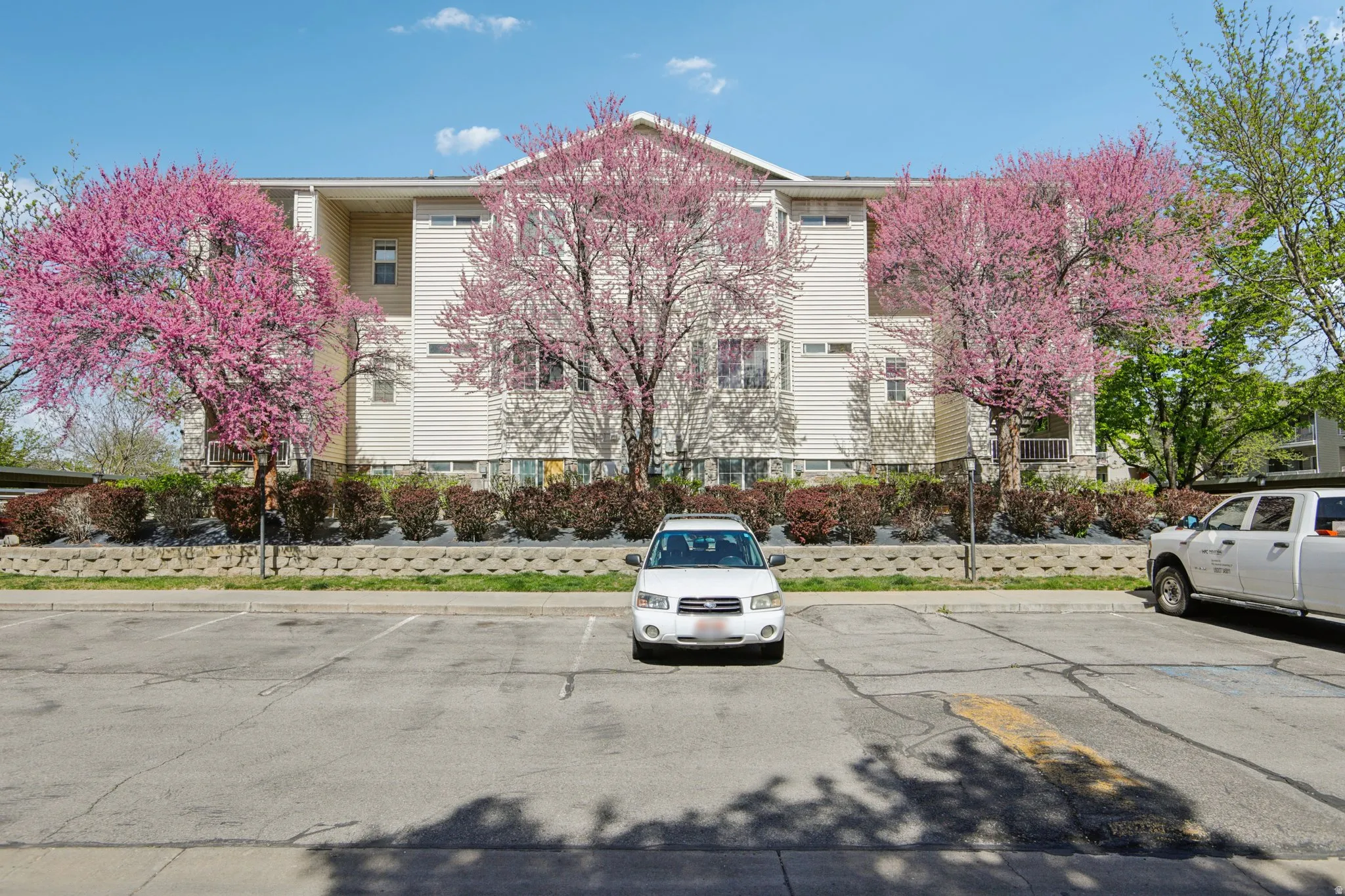 View of front of home featuring uncovered parking