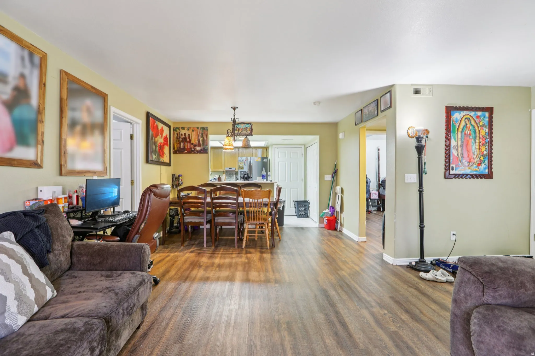 Living area featuring wood finished floors and baseboards
