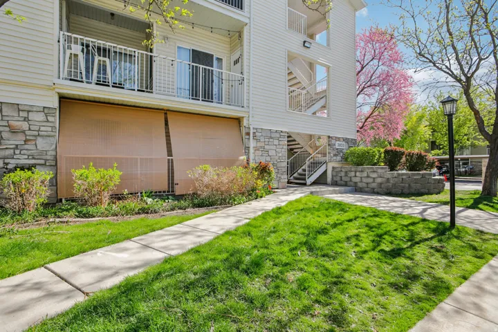 View of apartment building / complex featuring stairs