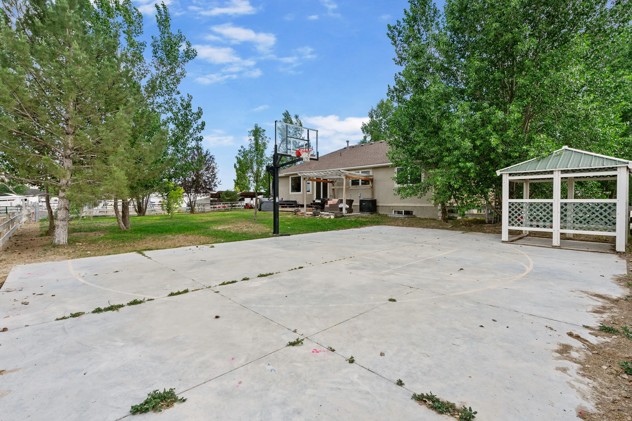 View of patio / terrace with basketball court and a gazebo