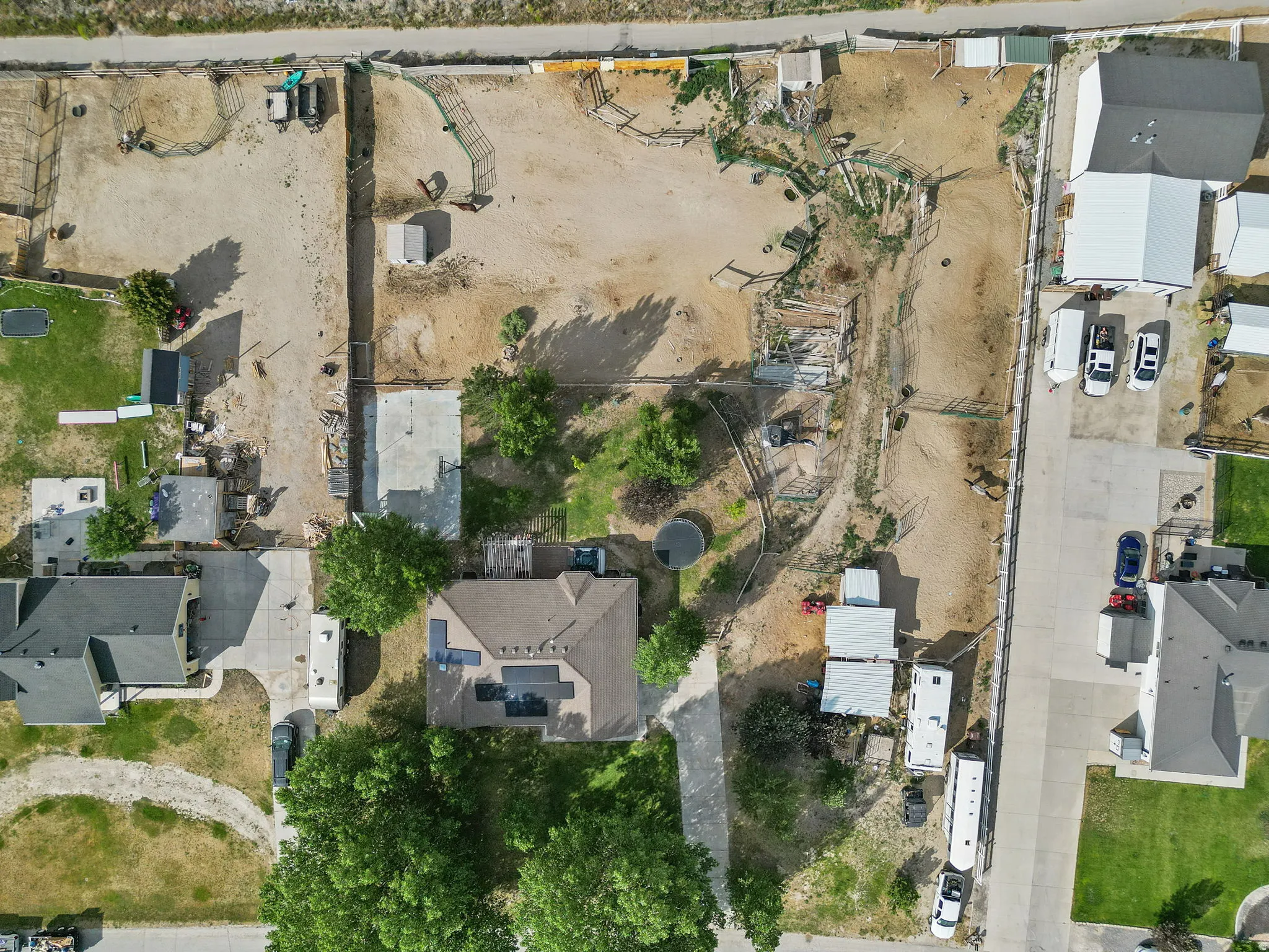 Aerial overview of property's location featuring nearby suburban area