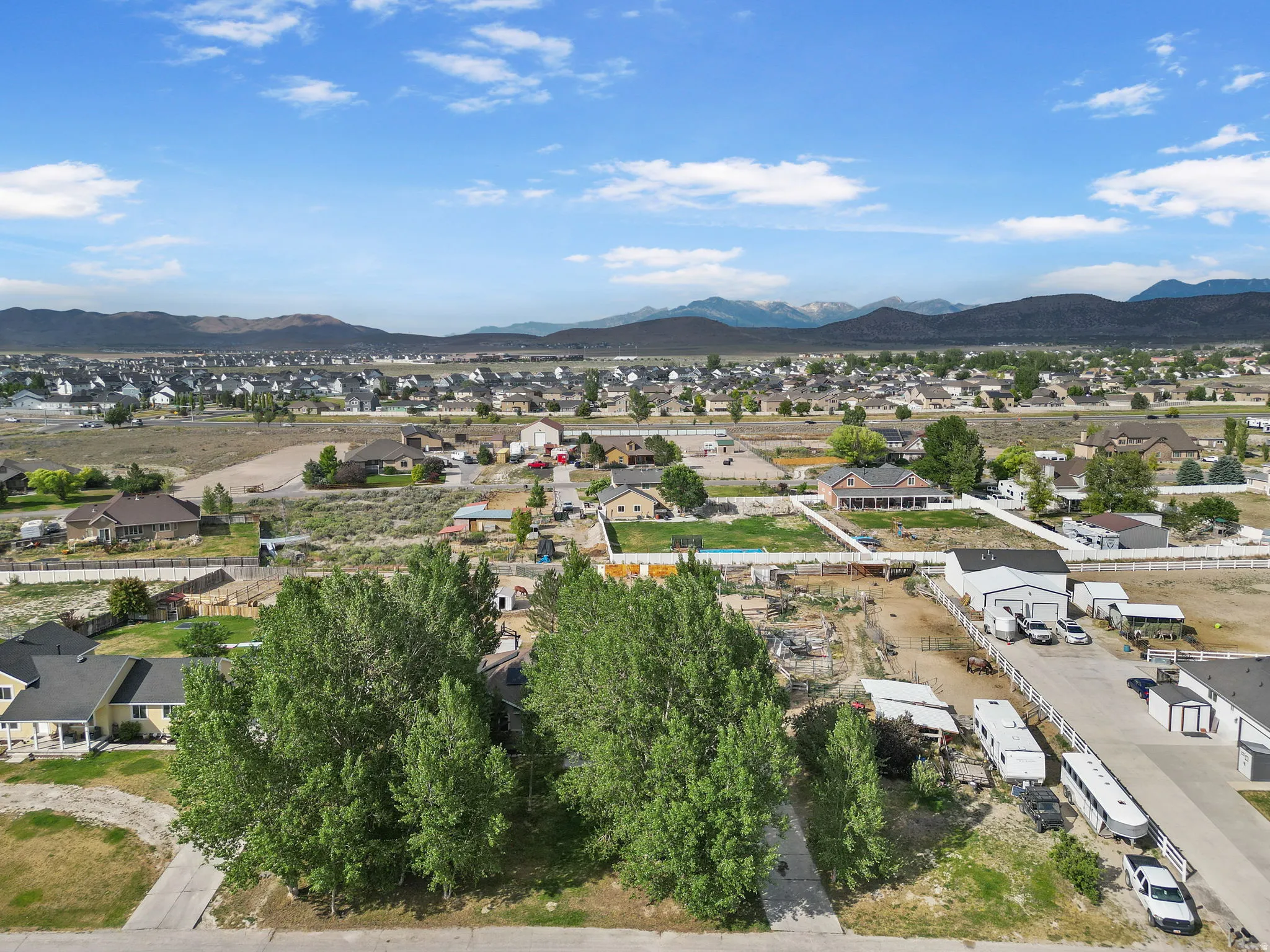 Aerial view of residential area featuring mountains