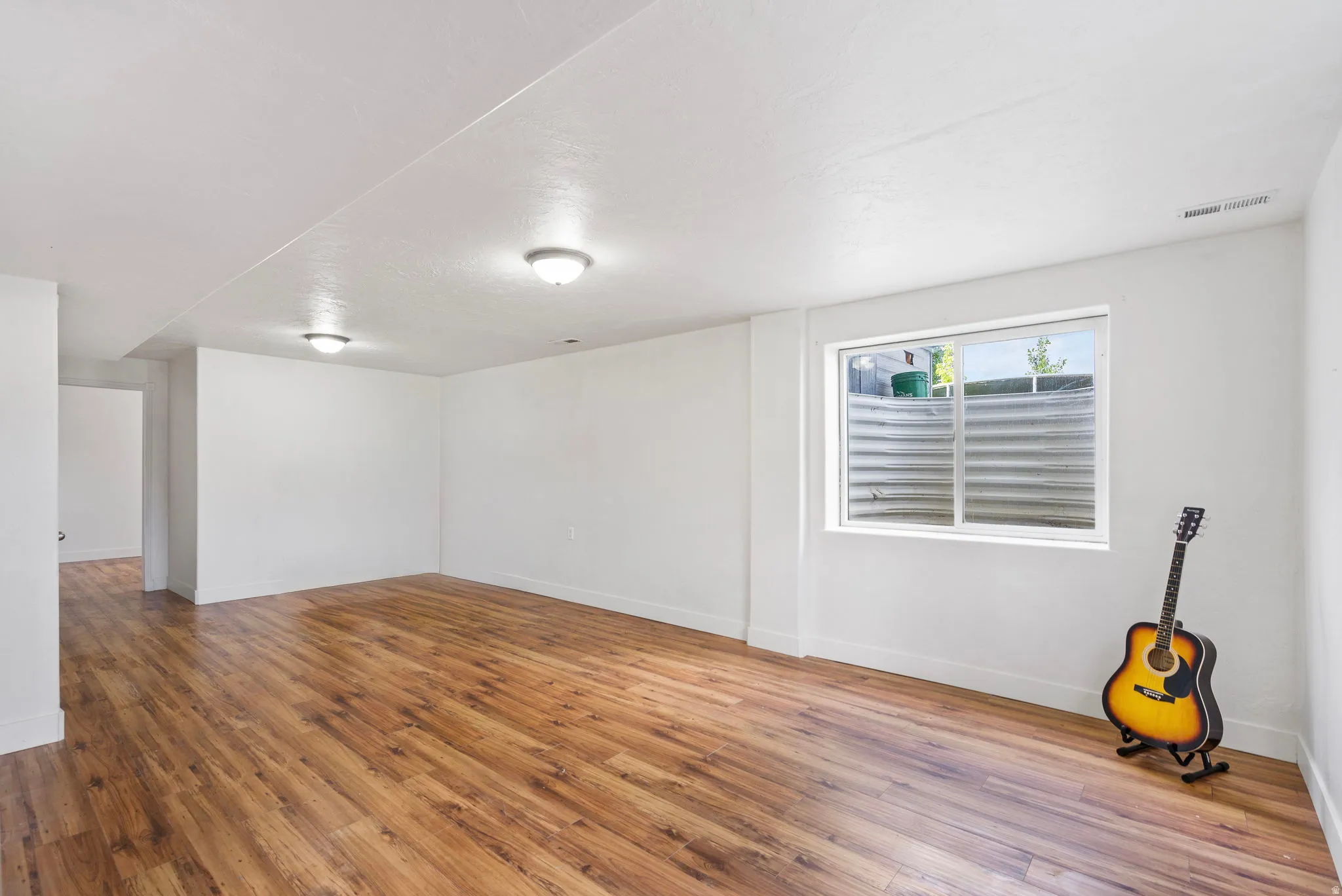 Empty room with wood finished floors