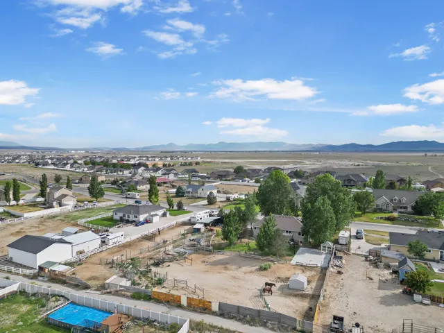 Aerial view of residential area with a mountainous background
