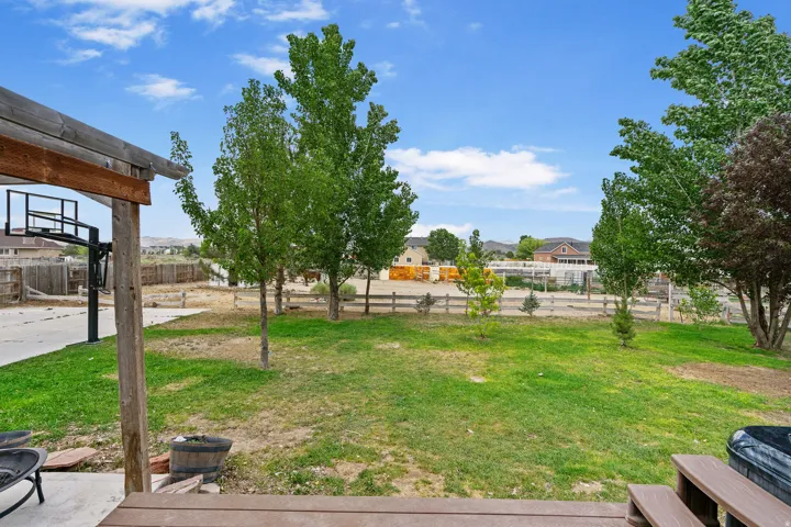 Fenced backyard featuring a patio area