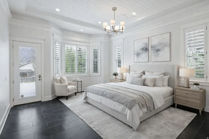 Bedroom featuring access to exterior, suspended lighting, and wooden ceiling