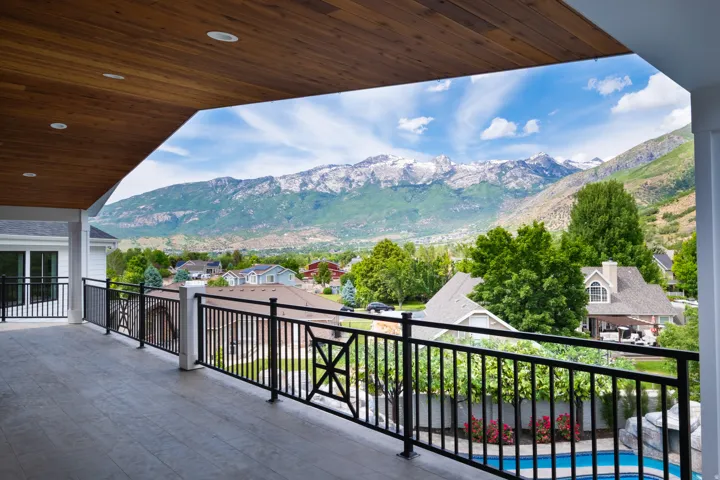 Balcony with a residential view and a mountain view