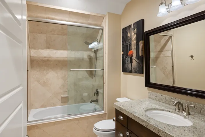Full bathroom with vanity and tiled shower / bath