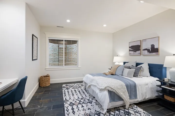 Bedroom with baseboards and recessed lighting