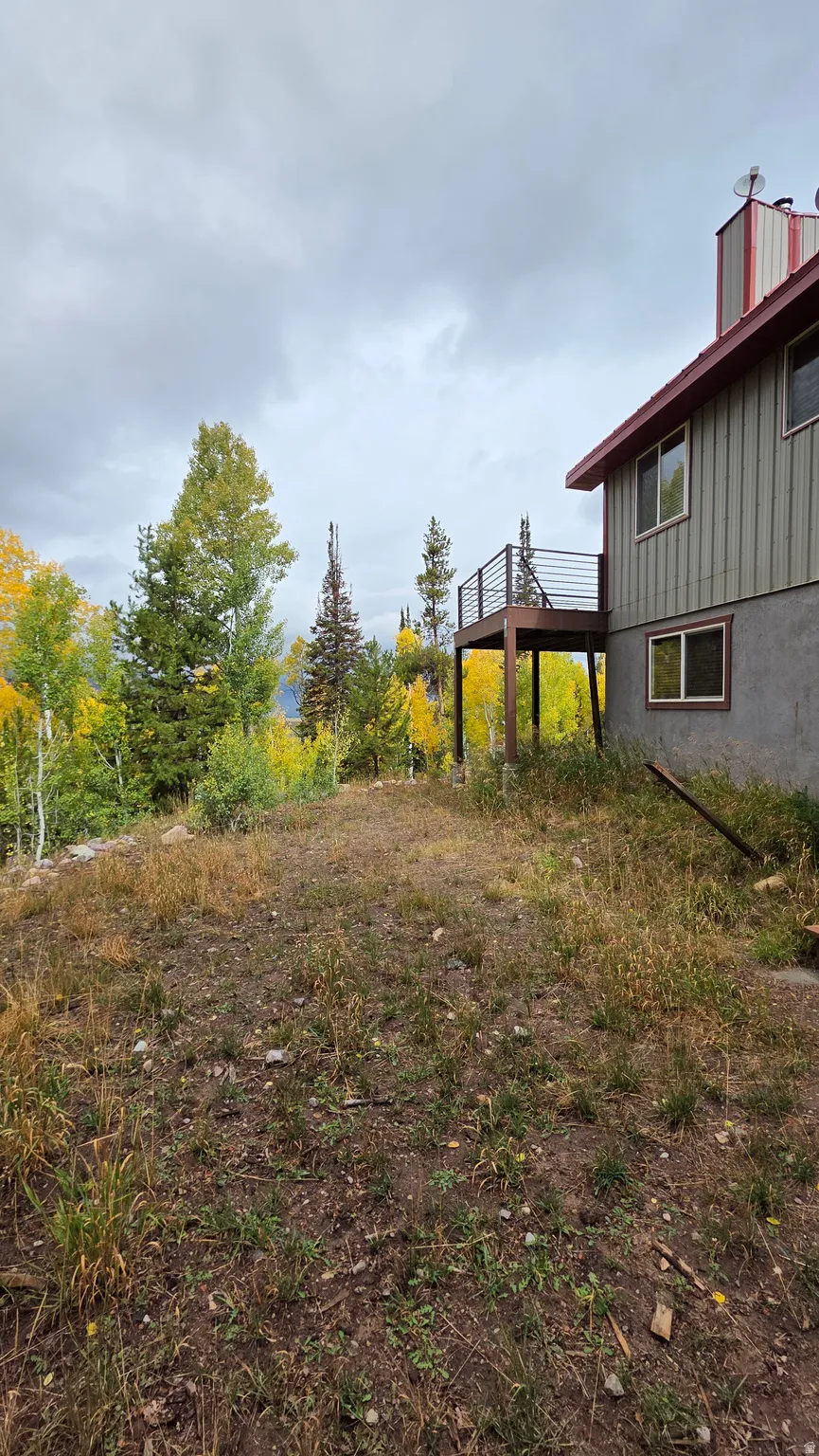 View of yard with a deck